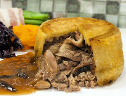 Duck, port and wild mushroom pudding